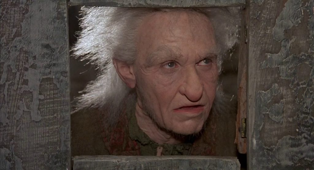 Billy Crystal in old-age makeup as Miracle Max.